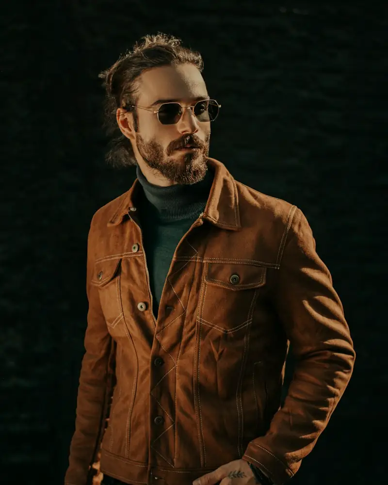 Man in a tan suede trucker jacket